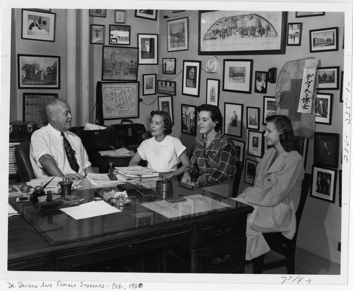 Davison with three female students, 1950