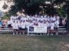 The DCCC participating in the Susan G. Komen Race for the Cure. Colvin is the leftmost figure holding the banner.